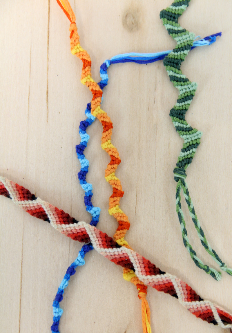zig zag friendship bracelet pattern both types on a wood background
