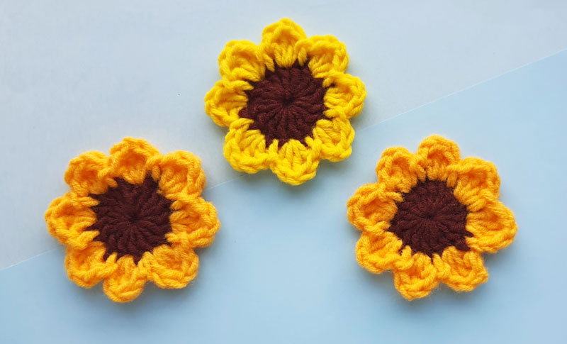  12 Crochet Mini flower embellishments in Yellow 