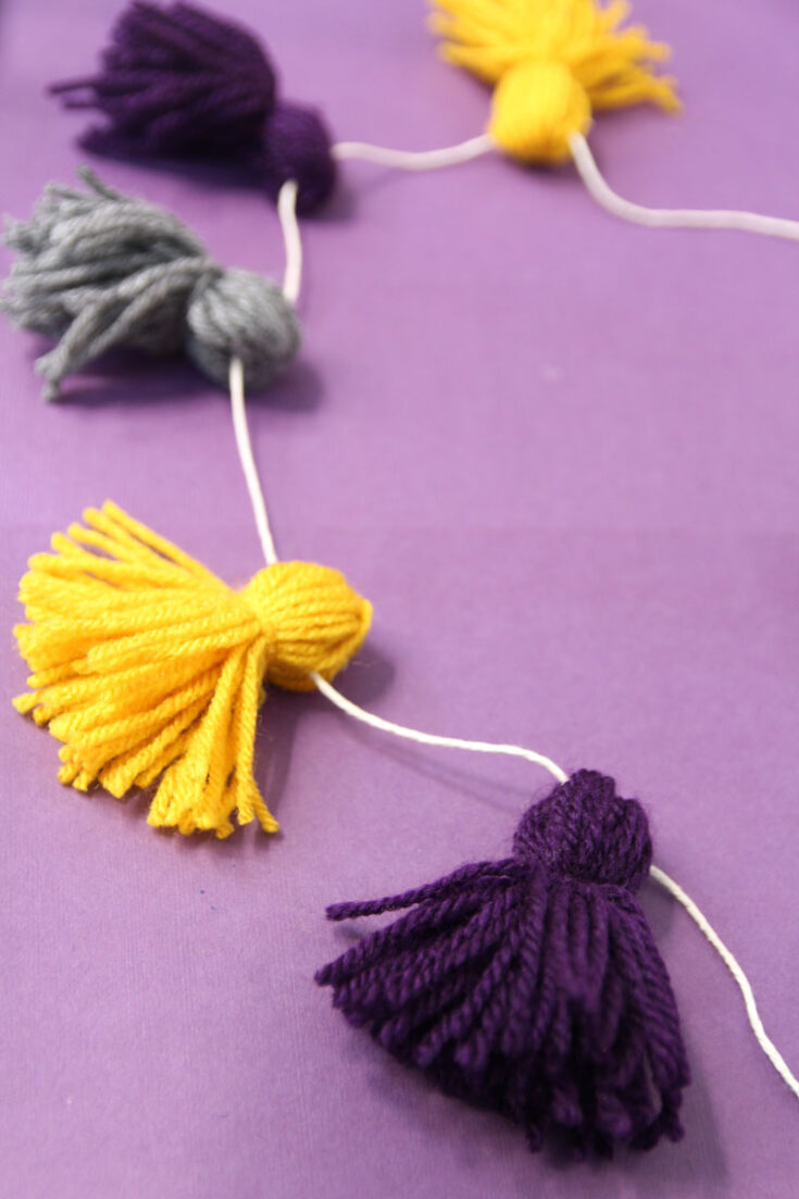 How to Make a Yarn Tassel Garland * Moms and Crafters