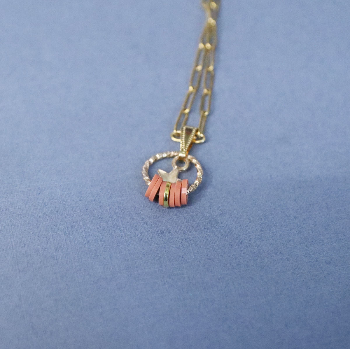 clay bead necklace with a pendant 